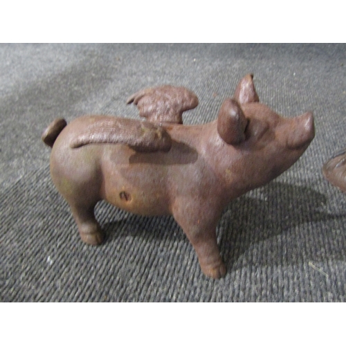 1102 - A cast iron cockerel (32cm height) and a cast iron flying pig moneybox (18.5cm length) (2)