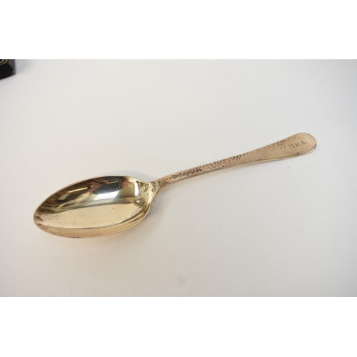 5063 - An Atkin Brother silver hammered bowl and spoon monogrammed M.R.A., Sheffield 1925, 1920.  The bowl ... 