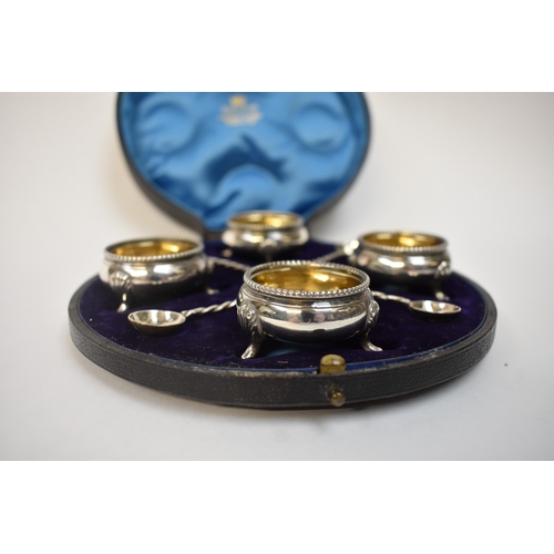5048 - A set of four John Wilmin Figg silver salts, beaded rims with gilding, each raised on three feet, to... 