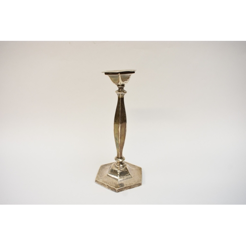 5024 - A silver candlestick with hexagonal top and base, Birmingham 1919, 23cm tall, weighted base dented