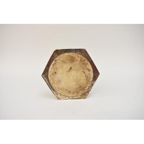 5024 - A silver candlestick with hexagonal top and base, Birmingham 1919, 23cm tall, weighted base dented