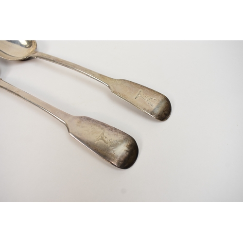 5089 - Two silver basting spoons with stag's head crest, London 1836, 30.5cm long.  324g