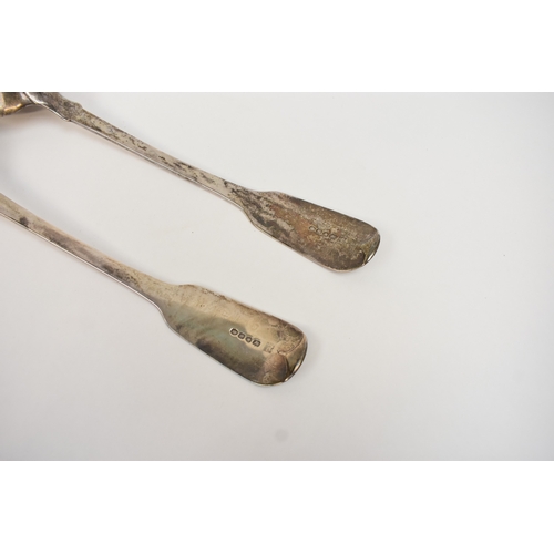 5089 - Two silver basting spoons with stag's head crest, London 1836, 30.5cm long.  324g