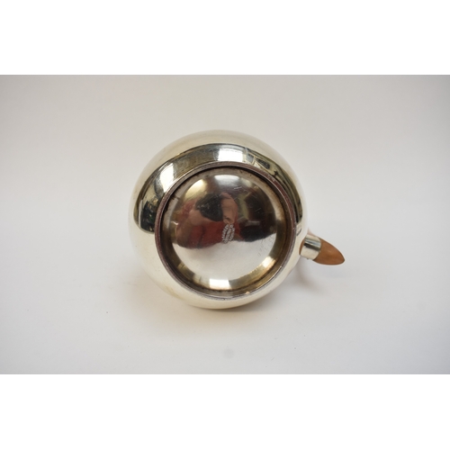 5021 - An Edwardian silver lidded jug of baluster form, with light wood handle. London 1908. By Lambert & C... 