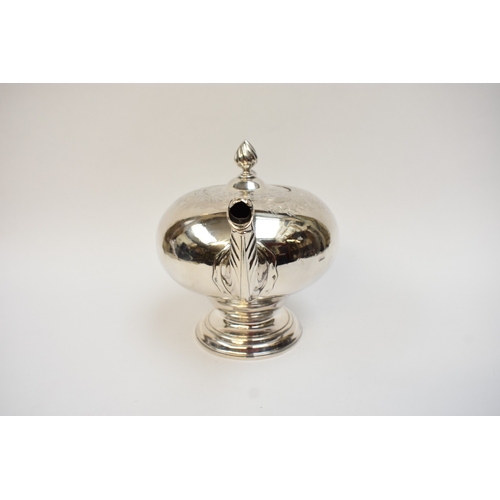 5003 - A George II silver pedestal ogee-shaped teapot, with foliate-chased shoulders, engraved crest, and e... 