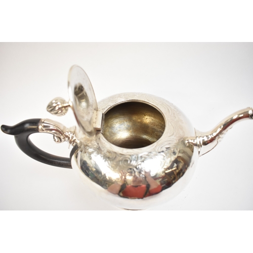 5003 - A George II silver pedestal ogee-shaped teapot, with foliate-chased shoulders, engraved crest, and e... 