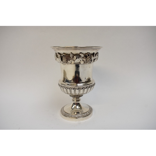 5026 - A late George III silver pedestal cup, the semi-fluted waisted cylindrical bowl applied with a finel... 