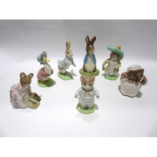 1842 - Seven Beswick Beatrix Potter figures - Gold stamped - 