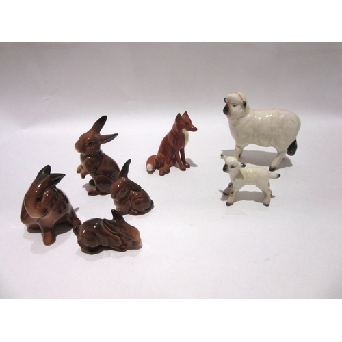 1857 - A Beswick Sheep, model no. 935 (leg restored), Beswick Lamb, model no. 938 (slight chip), Beswick Fo... 