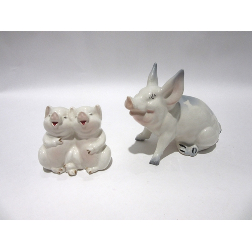 1859 - A Beswick Pig, model no. 832 together with Beswick Laughing Pigs, model no. 2103