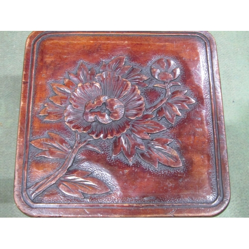 4007 - An oriental stool/jardinière stand with carved seat and bamboo style tapering legs