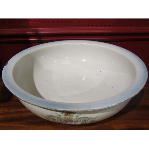 4041 - A V.P. Co. Burslem wash jug and bowl, loss to rim