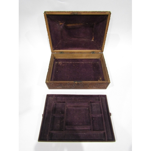 4011 - A late 19th/early 20th Century Chinese carved wooden jewellery box, flora/fauna carving with buildin... 