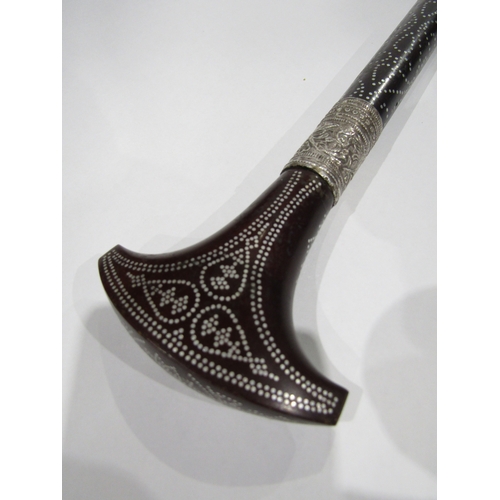 4015 - A piqué inlaid walking stick with white metal collars, 93cm long
