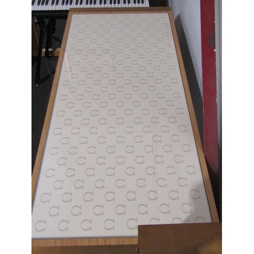 1024 - An Omega top showroom boutique table with glass insert over two soft close drawers on a metal frame ... 