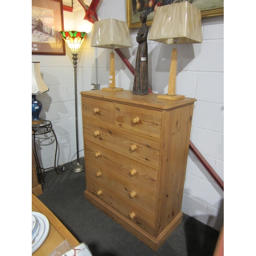1009 - A modern pine chest of two short over three long drawers on plinth base, 118cm tall x 95cm wide x 43... 