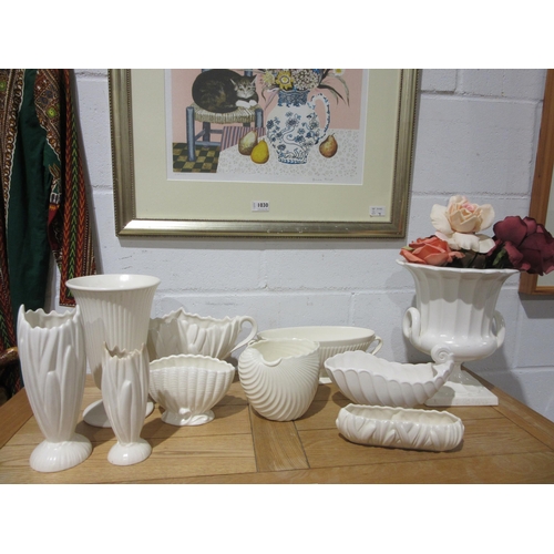 1031 - A collection of cream glazed urns and vases etc. including Sylvac and Wedgwood (10)