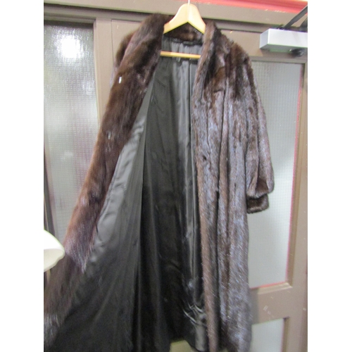 1038 - PELZ GUZIK - a dark brown mink full length fur coat with full sleeve and deep cuff