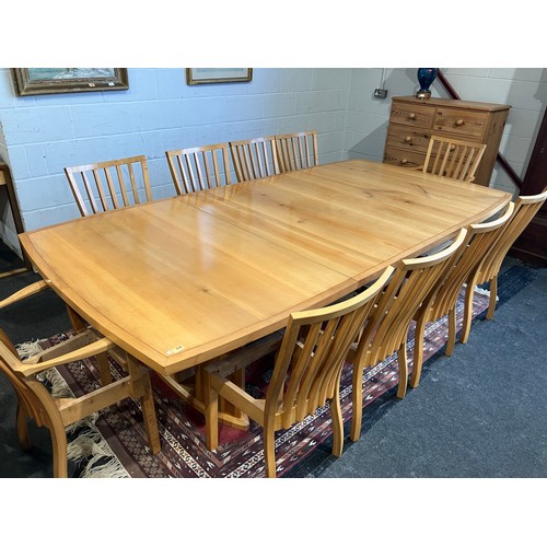 1020 - An extending dining table and ten chair frames (8+2 carvers) in London Plane timber by Cy Woodrow, N... 