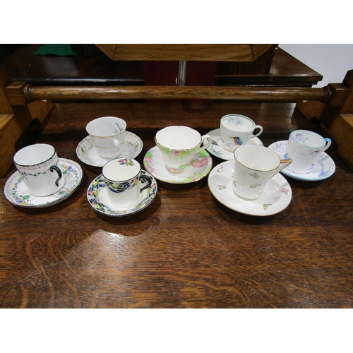 4055 - Three coffee cans and saucers, Royal Doulton, Grosvenor China, Tuscan 