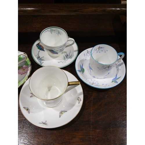 4055 - Three coffee cans and saucers, Royal Doulton, Grosvenor China, Tuscan 