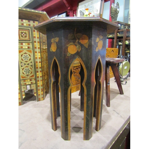 4008 - An Arts & Crafts painted jardiniere stand of Moorish form with fruit decoration, 41cm tall