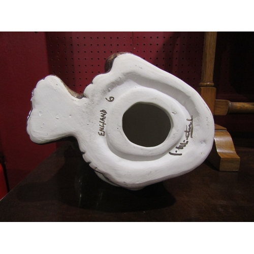 4029 - A Winstanley seated cat, white and grey with blue glass eyes, 33cm tall