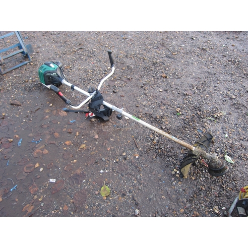 3342 - A Qualcast straight shaft strimmer