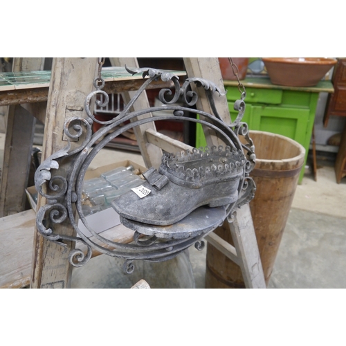 2011 - An early 20th Century wrought iron shoe shop display sign