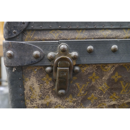 2007 - A well worn travel case by Louis Vuitton, no lock plate, 90x53x58cm tall