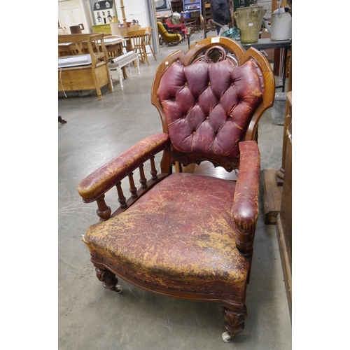 2010 - A Victorian Gothic oak red leather armchair