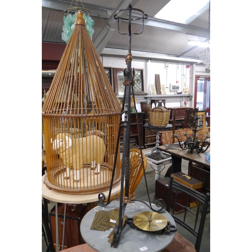 2052 - A wrought iron ecclesiastical lamp stand