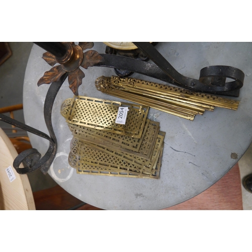 2054 - Four pairs of turn of the Century brass pierced door plates and corner mouldings