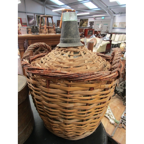 2025 - A vintage French wine bottle in basket Bordeaux vineyard, together with antique malting shovel and a... 