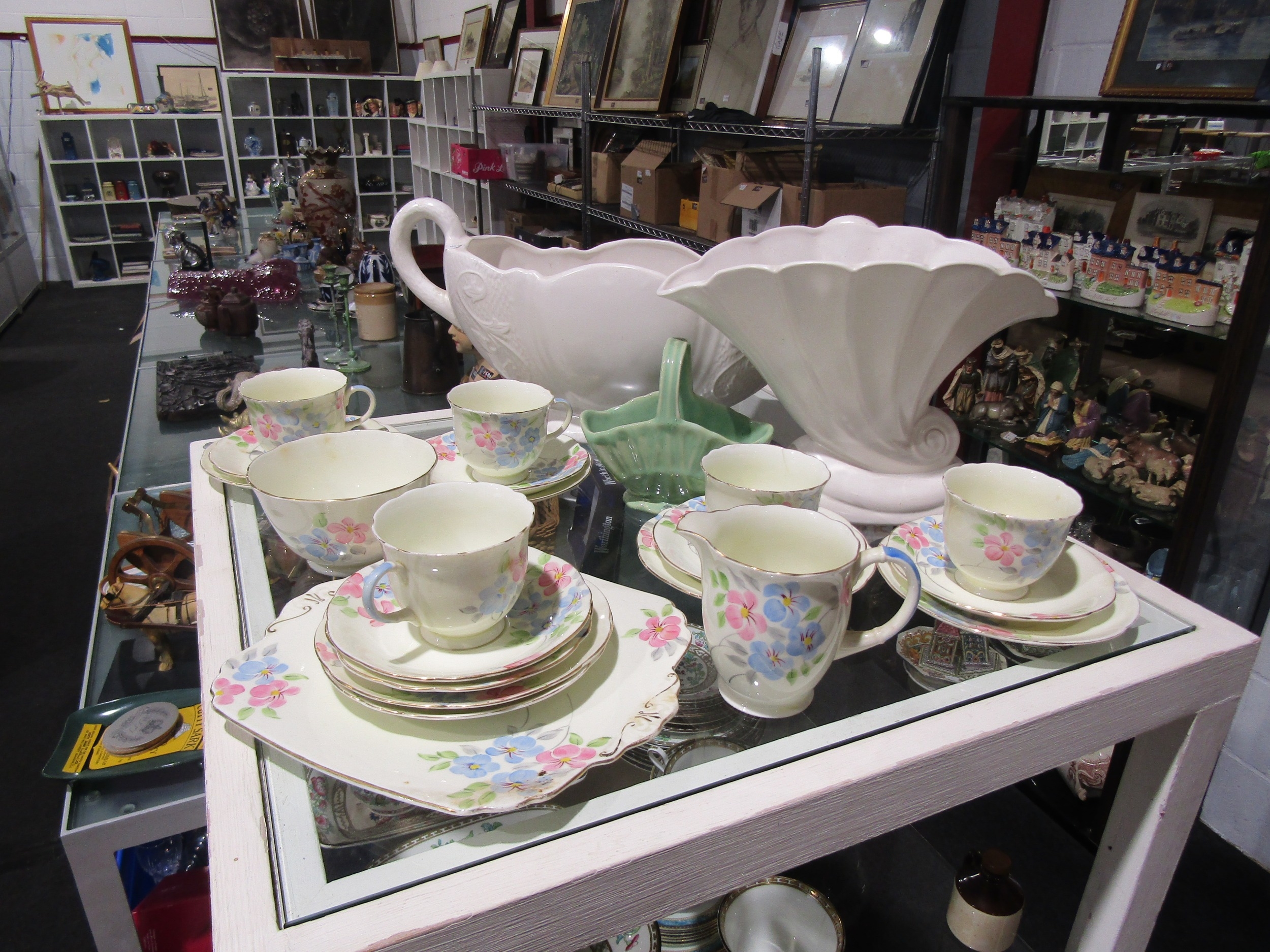 A Foley part tea set and three ceramic jardinières