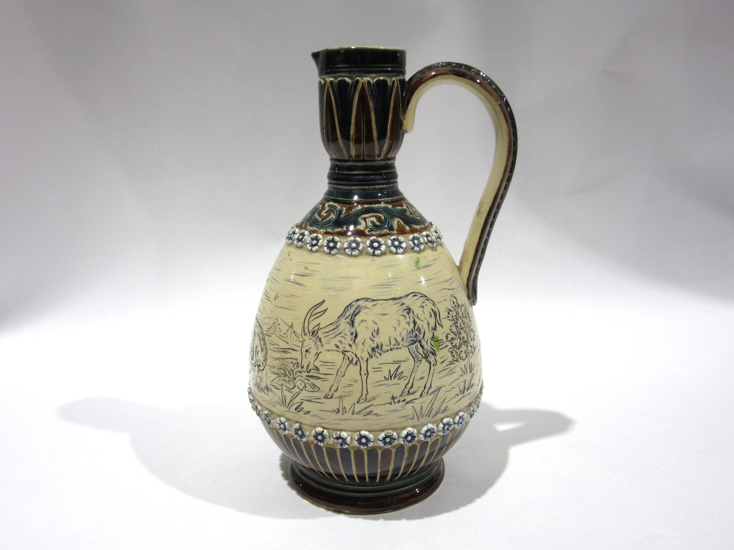A Royal Doulton jug designed by Hannah Barlow, decorated in sgraffito ...