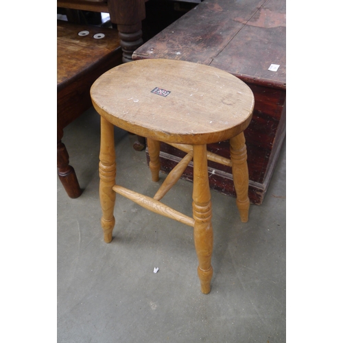 2053 - An elm stool 53cm tall