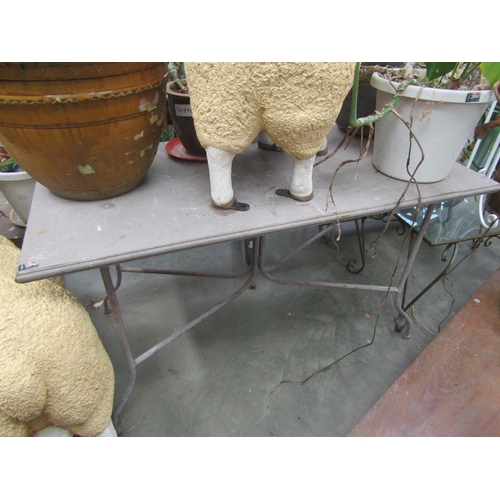 2040 - A metal garden table 70 x 140cm