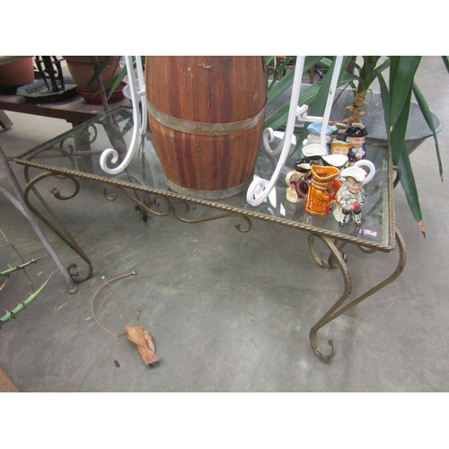 2048 - A wrought iron glass top coffee table