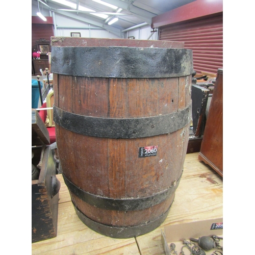 2060 - An oak half barrel stick stand