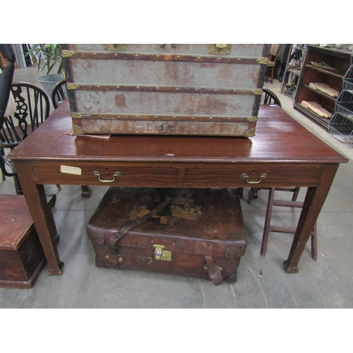 2024 - A mid 20th Century oak two drawer table, square tapering supports 90x152cm