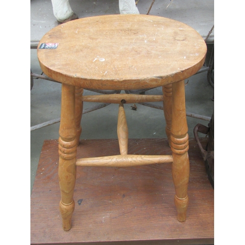 2039 - An elm stool 53cm tall