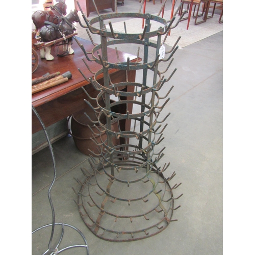 2027 - A metal bottle drying rack, 104cm tall