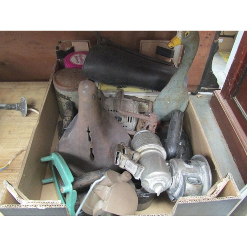 2051 - Three Bygone irons, a mini iron cauldron, two books and a bike saddle