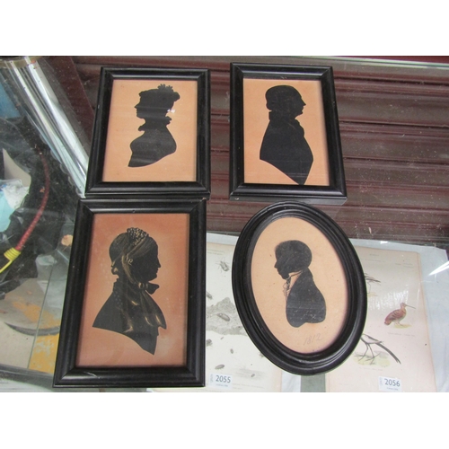 2053 - Four 19th Century silhouette portraits