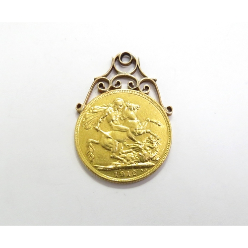 7520 - A 1912 gold sovereign with soldered pendant loop, 8.7g