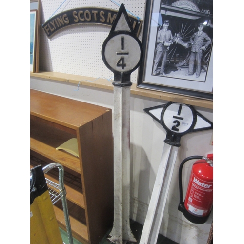 7014 - A cast iron 1/4 mile marker