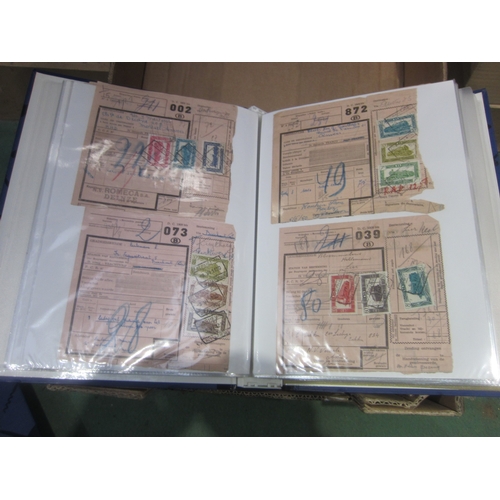 7025 - Three folders containing various Belgium parcel labels with attached stamps and Belgium railway line... 