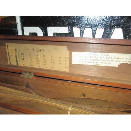 7047 - A mahogany cased collection of approx. 65 pearwood draughman's railway curves by Stanley of London, ... 