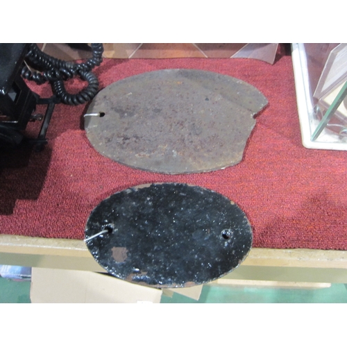 7077 - A cast iron plaque 34A and 70 damaged